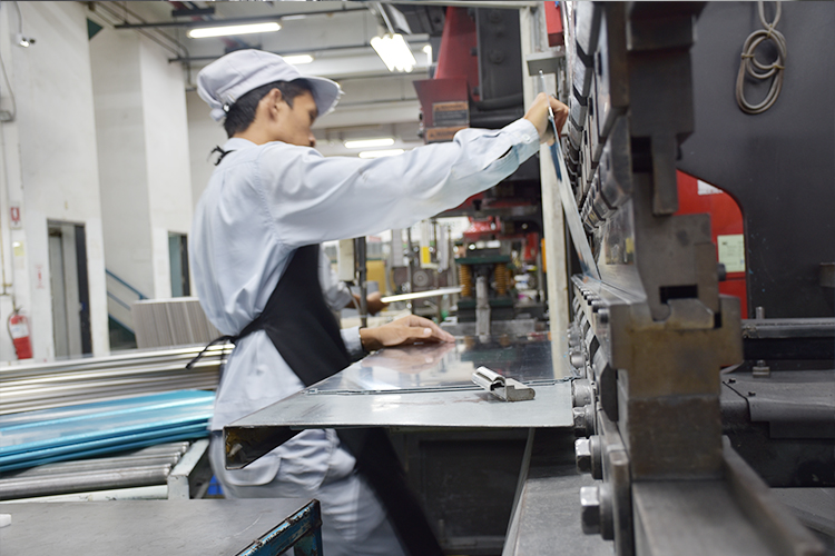 Technician reviewing drawings
